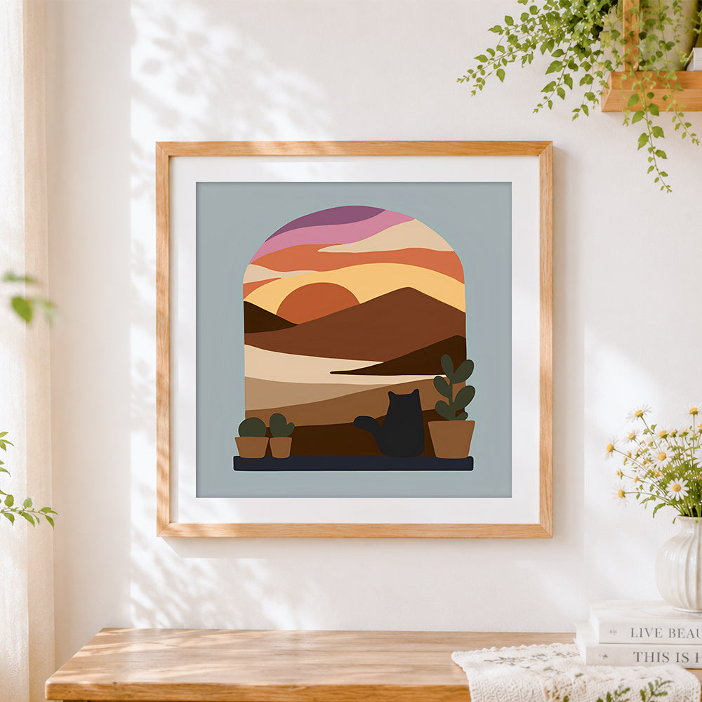 Finished cat in arch window sunset cross stitch artwork displayed
