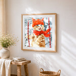 Cat in red hat and scarf in the snow cross stitch artwork displayed on wall as home decor