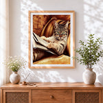 Finished cat reading newspaper cross stitch artwork displayed