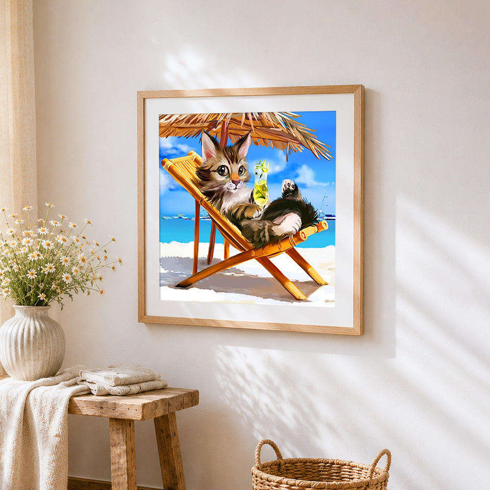 Cat relaxing on beach holiday cross stitch artwork displayed on wall as home decor