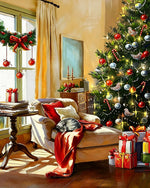 Cat sleeping on an armchair by the christmas tree cross stitch kit for beginners