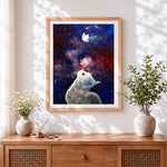 Finished cat watching a butterfly in space cross stitch artwork displayed