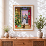 Finished cat watching snowball fight cross stitch artwork displayed
