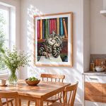 Cat writing at desk cross stitch artwork displayed on wall as home decor