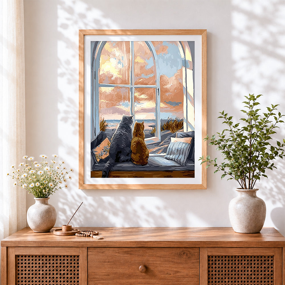 Finished cats by the window cross stitch artwork displayed