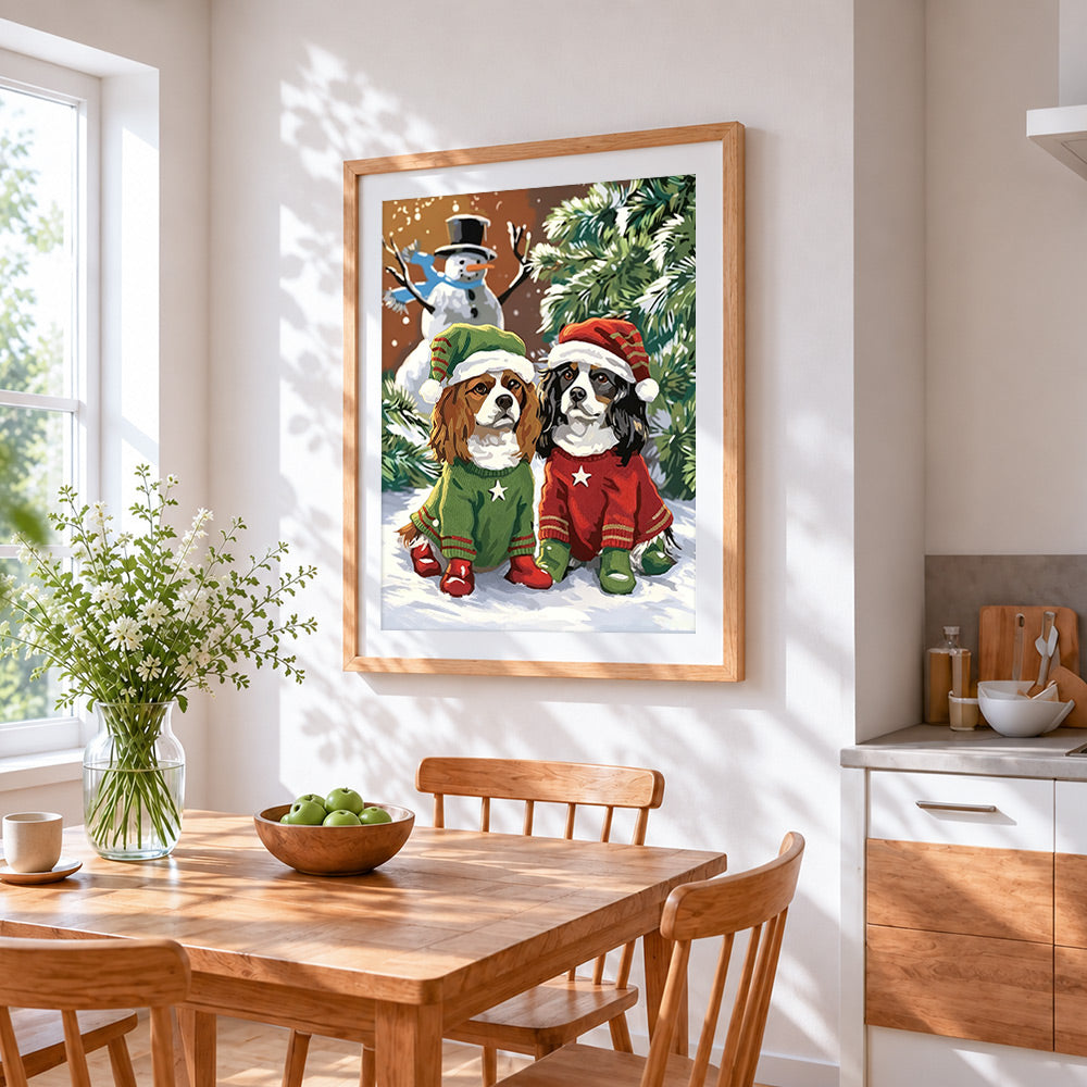 Cavalier king charles spaniels in christmas jumpers cross stitch artwork displayed on wall as home decor