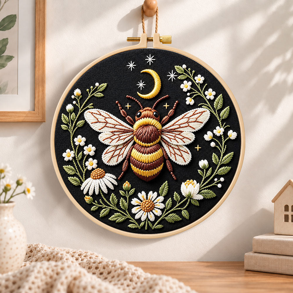 Celestial bee with daisies embroidery hoop wall art displayed as warm and cosy handmade home decor