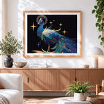 Finished celestial peacock with stars and moon cross stitch artwork displayed