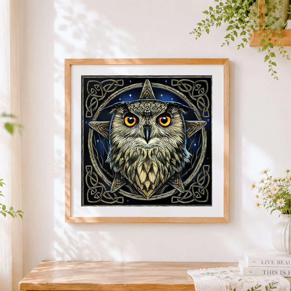 Finished celtic knot owl cross stitch artwork displayed