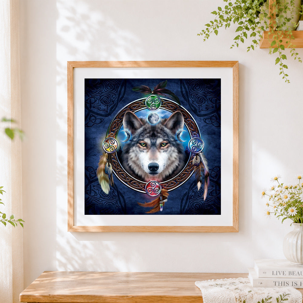 Finished celtic wolf with triskelion cross stitch artwork displayed