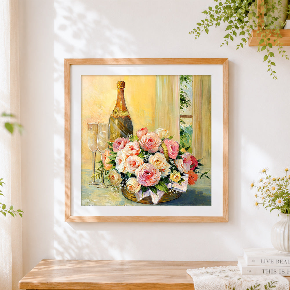 Finished champagne and roses basket still life cross stitch artwork displayed