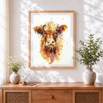 Finished charming highland cow cross stitch artwork displayed