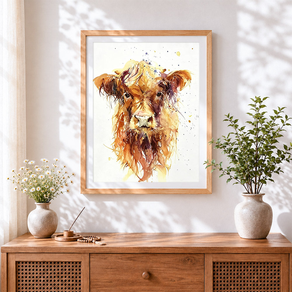 Finished charming highland cow cross stitch artwork displayed