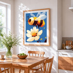 Cheerful bumblebee and white blossom cross stitch artwork displayed on wall as home decor
