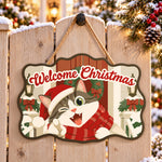 Cheerful cat holiday paint by numbers door hanger on a garden gate