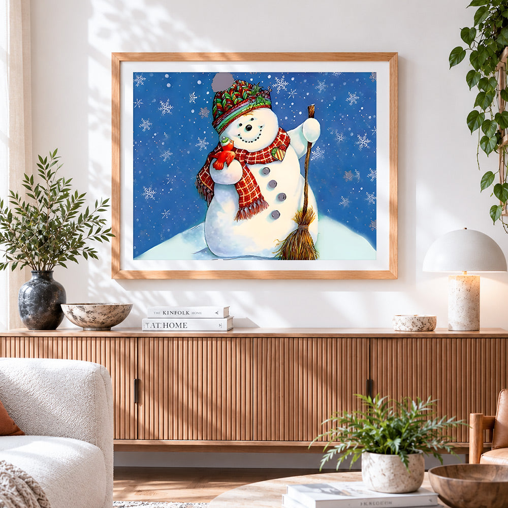 Finished cheerful snowman with broom cross stitch artwork displayed