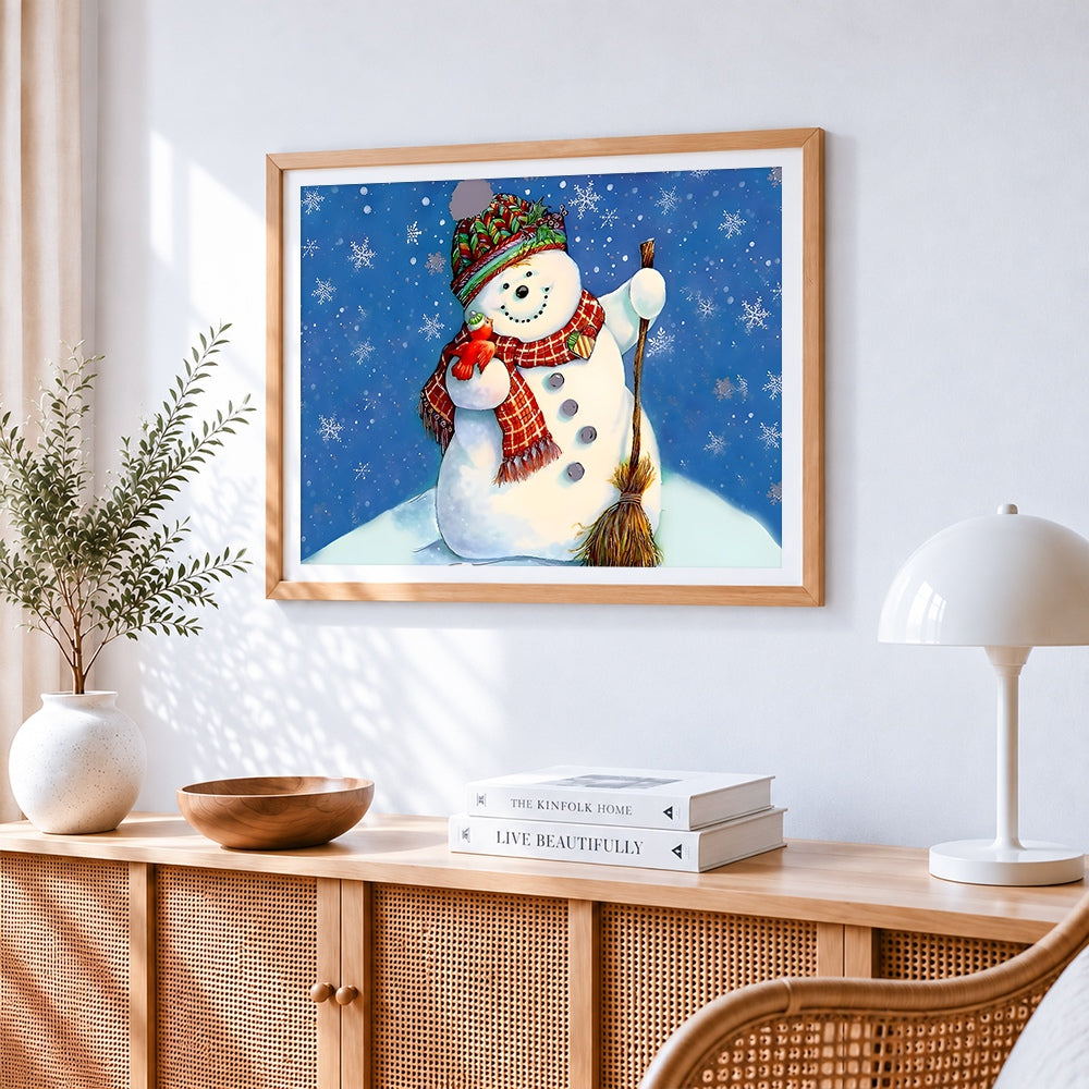 Cheerful snowman with broom cross stitch artwork displayed on wall as home decor