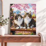 Finished cherry blossom cats pearl diamond painting artwork displayed as home decor