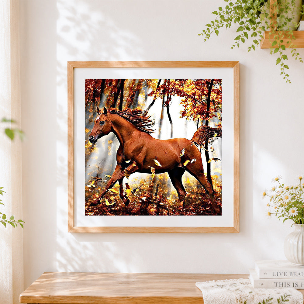 Finished chestnut horse running in autumn forest cross stitch artwork displayed