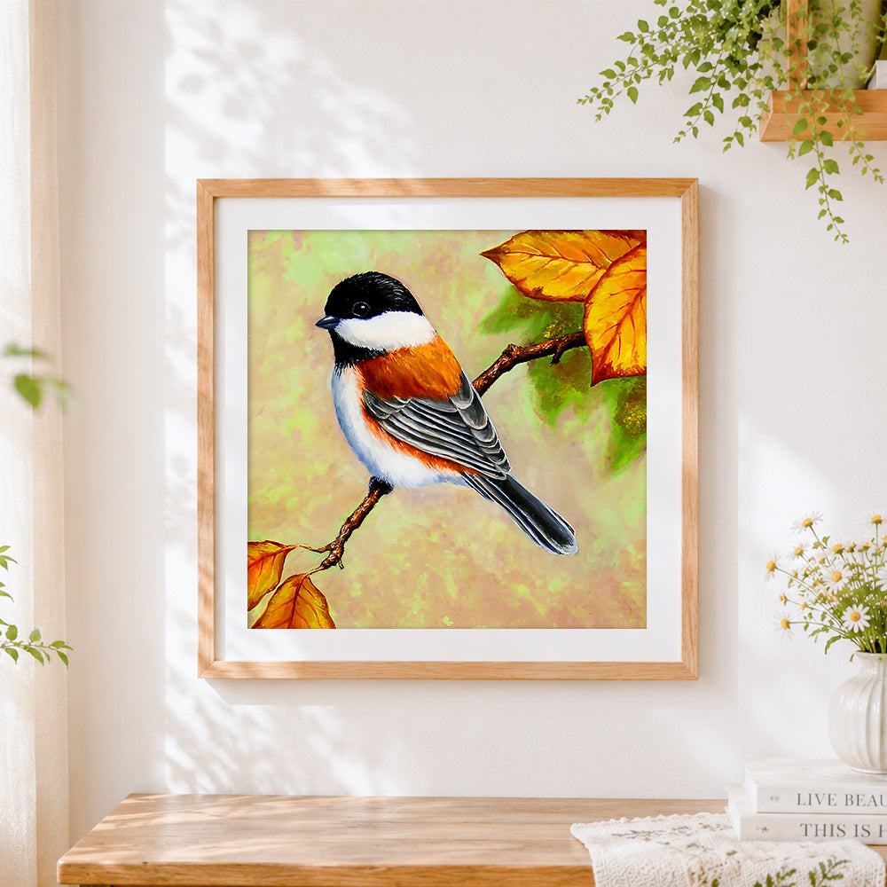 Finished chickadee on autumn branch cross stitch artwork displayed