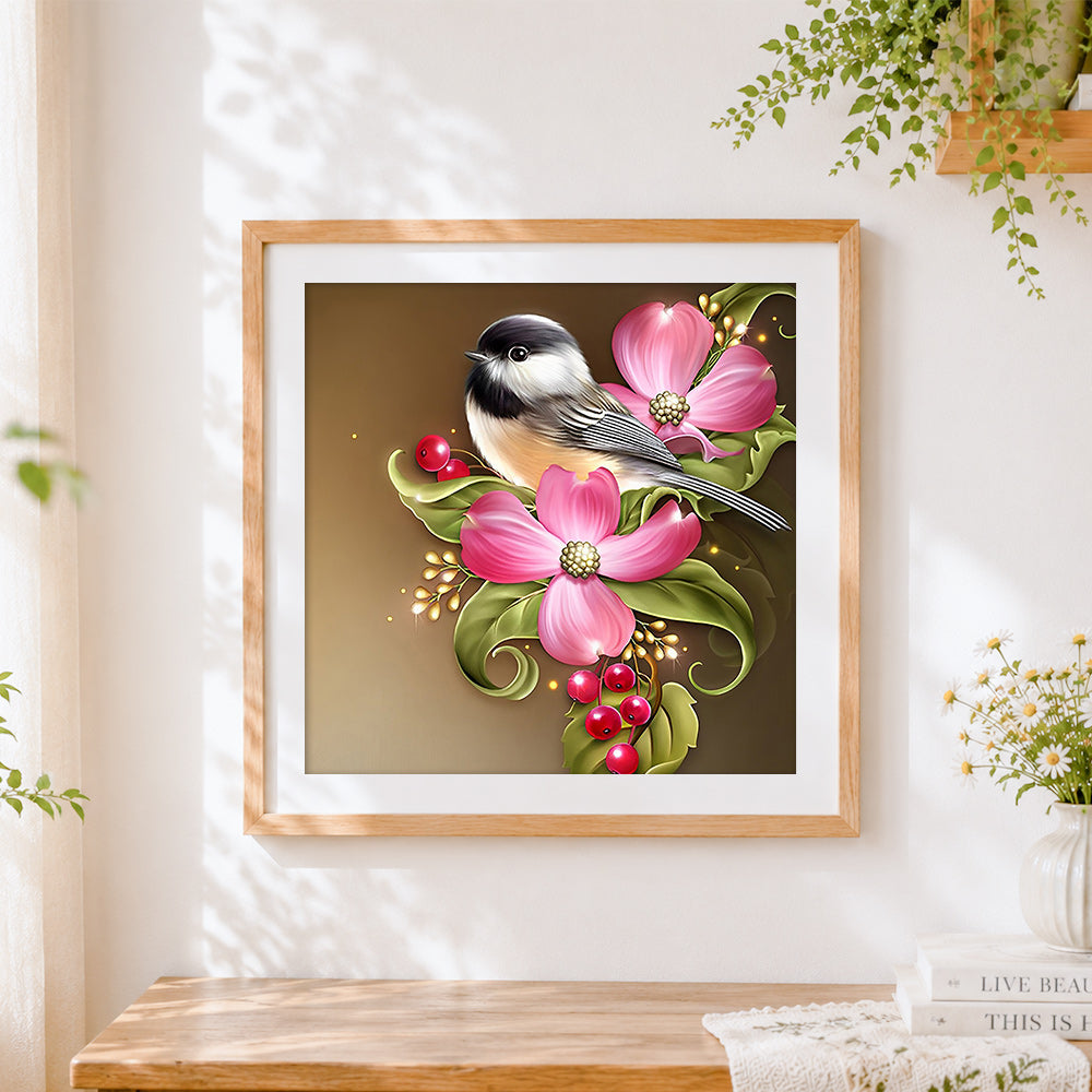 Finished chickadee with pink flowers cross stitch artwork displayed