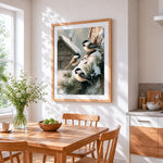 Chickadees in winter snow cross stitch artwork displayed on wall as home decor
