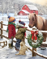 Children and pony in a snowy farm cross stitch kit for beginners