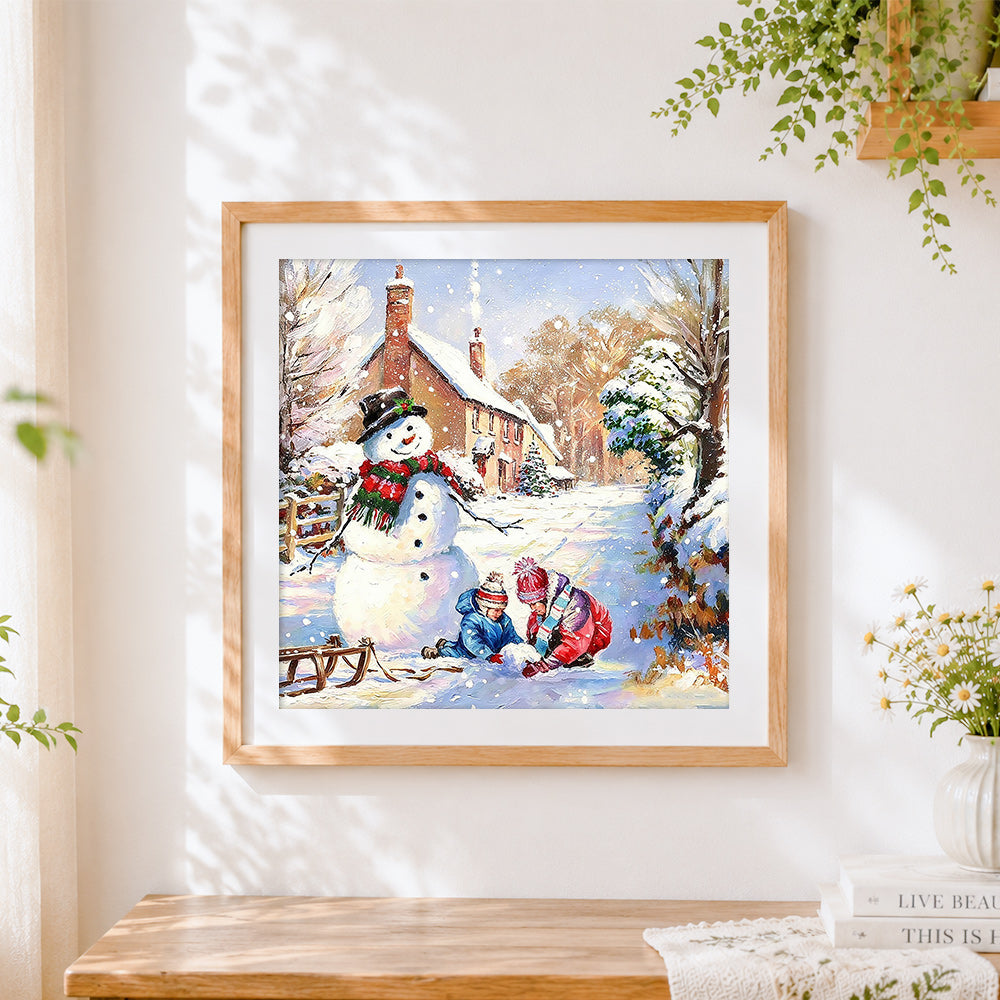 Finished children playing with snowman in the snow cross stitch artwork displayed