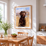 Chocolate labrador in reeds cross stitch artwork displayed on wall as home decor