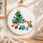 Christmas bear tree embroidery hoop wall art displayed as warm and cosy handmade home decor