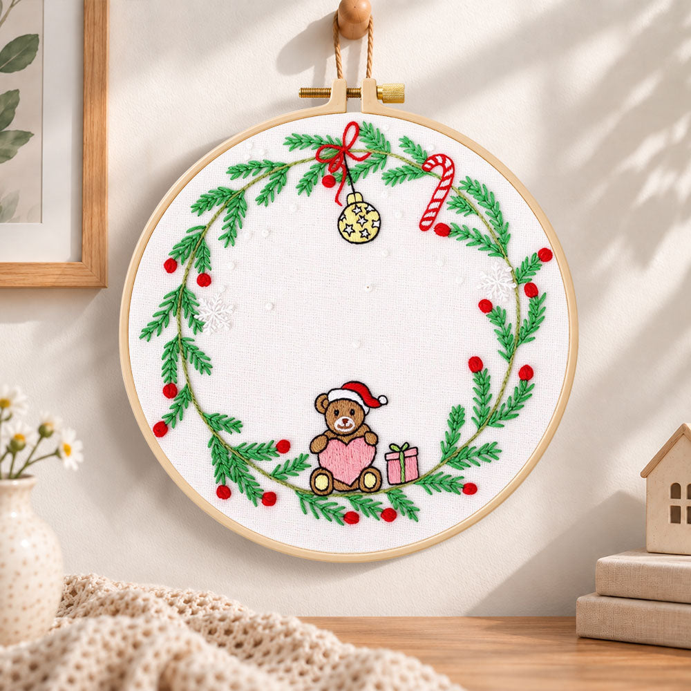 Christmas bear wreath embroidery hoop wall art displayed as warm and cosy handmade home decor