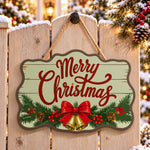 Christmas bells and bow paint by numbers door hanger on a garden gate