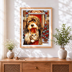 Finished christmas dog and kitten cross stitch artwork displayed