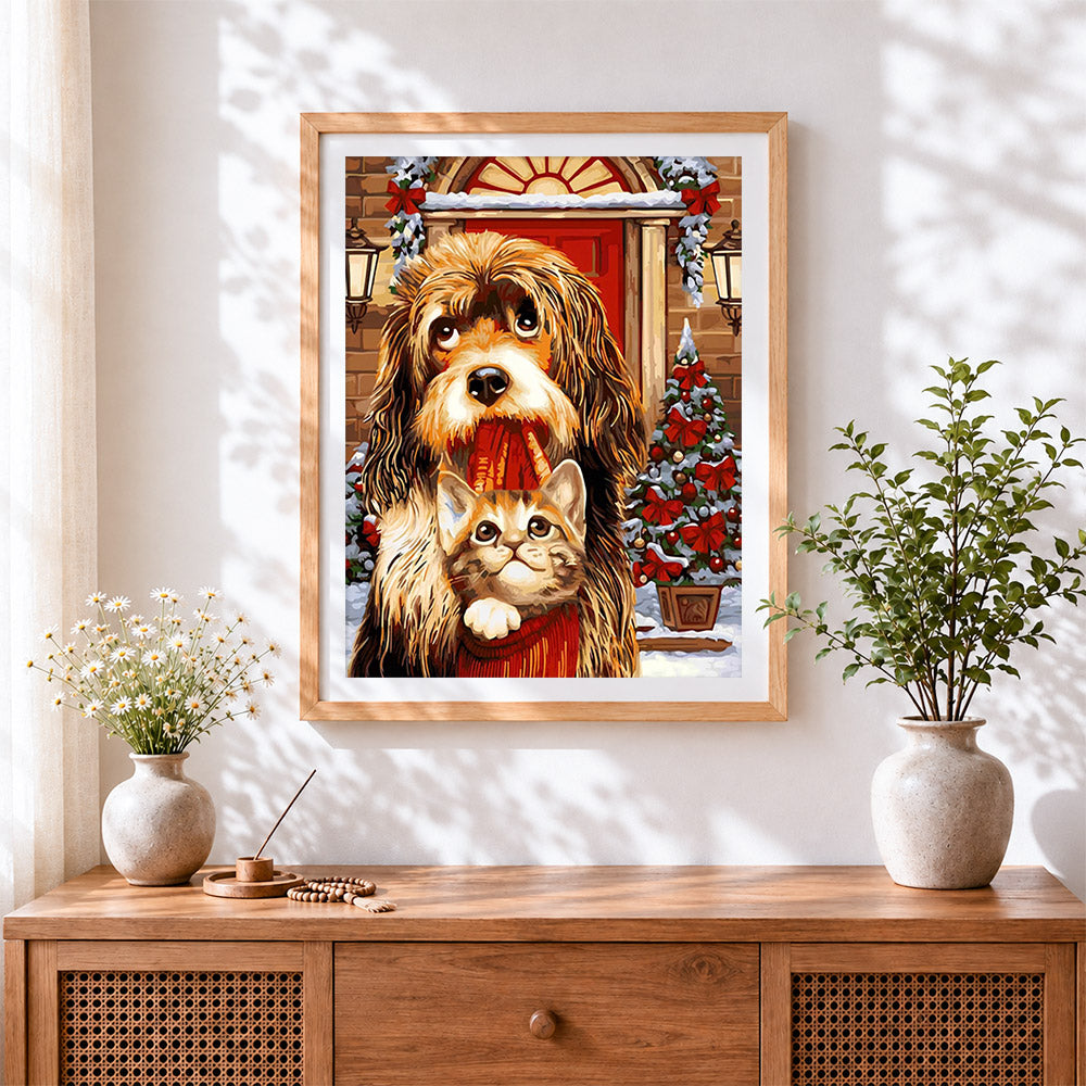Finished christmas dog and kitten cross stitch artwork displayed