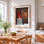 Christmas gnome with red hat and lantern cross stitch artwork displayed on wall as home decor