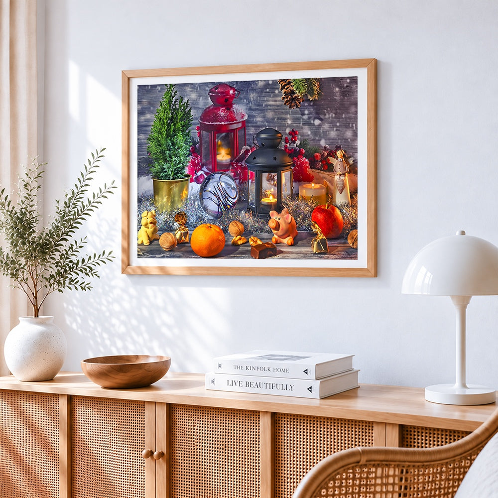 Christmas lanterns and candles cross stitch artwork displayed on wall as home decor