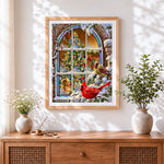 Finished christmas tree and red cardinals cross stitch artwork displayed