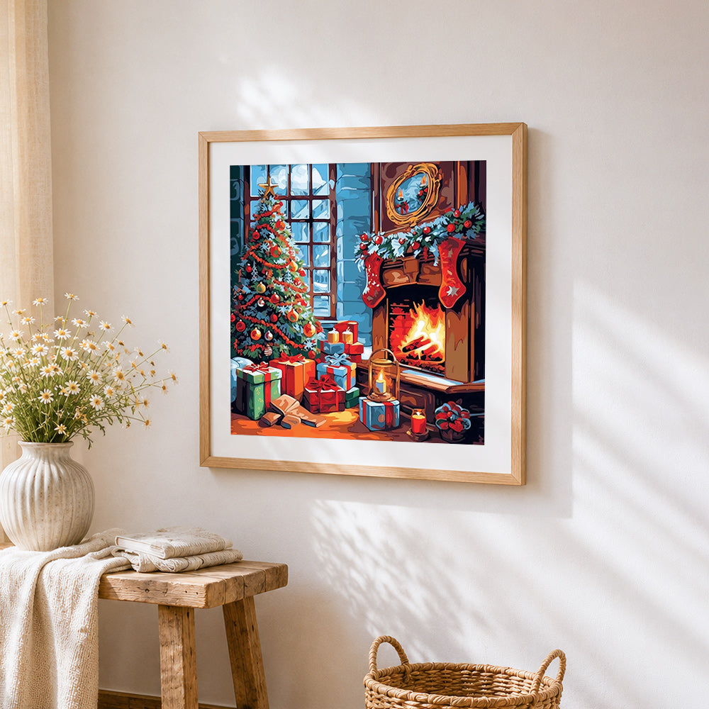 Christmas tree, fireplace and gifts cross stitch artwork displayed on wall as home decor