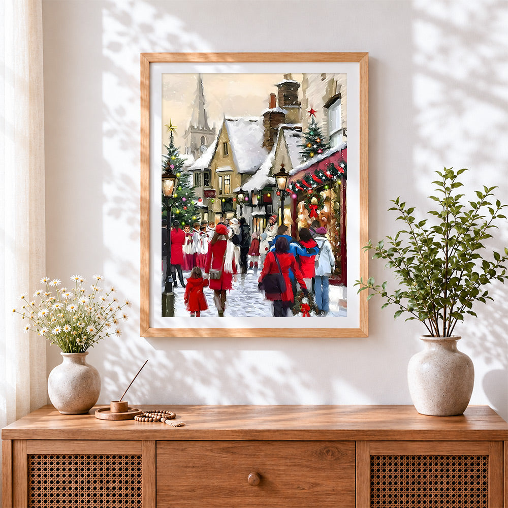 Finished christmas village street scene cross stitch artwork displayed