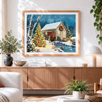 Finished christmas watermill scene with tree cross stitch artwork displayed