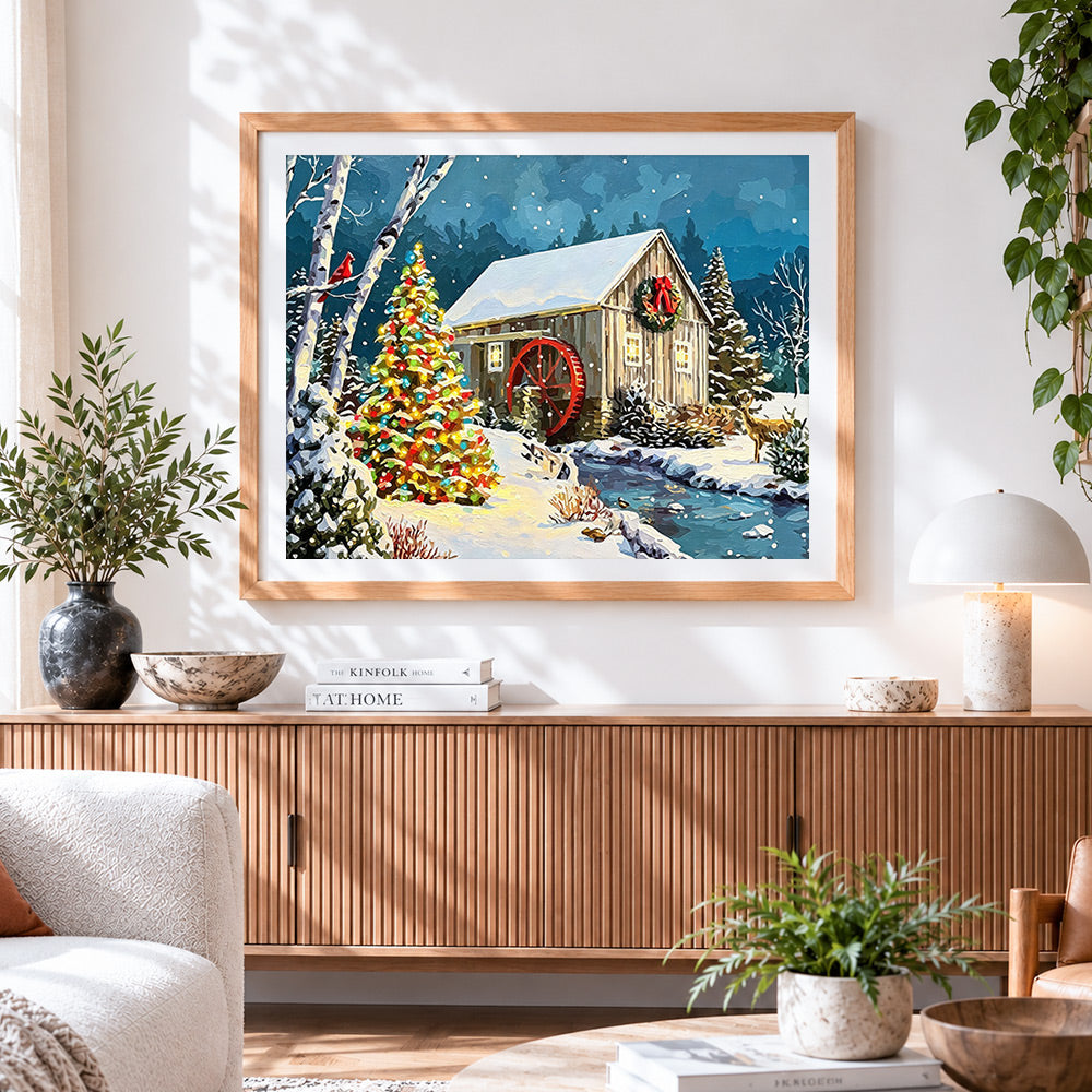 Finished christmas watermill scene with tree cross stitch artwork displayed