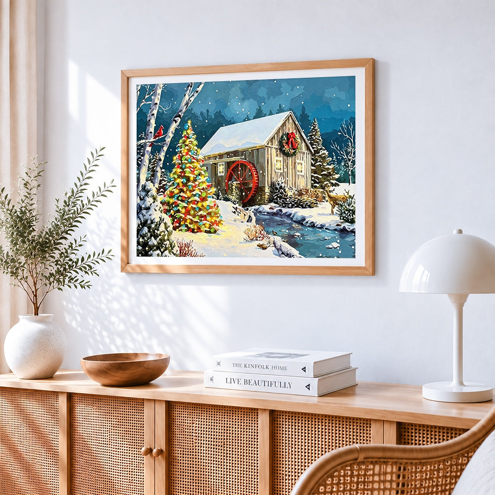 Christmas watermill scene with tree cross stitch artwork displayed on wall as home decor