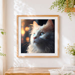 Finished cinematic white cat portrait cross stitch artwork displayed