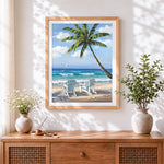 Finished classic beach chairs and palm tree cross stitch artwork displayed