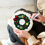 Creating handmade classic green holiday wreath unch needle artwork