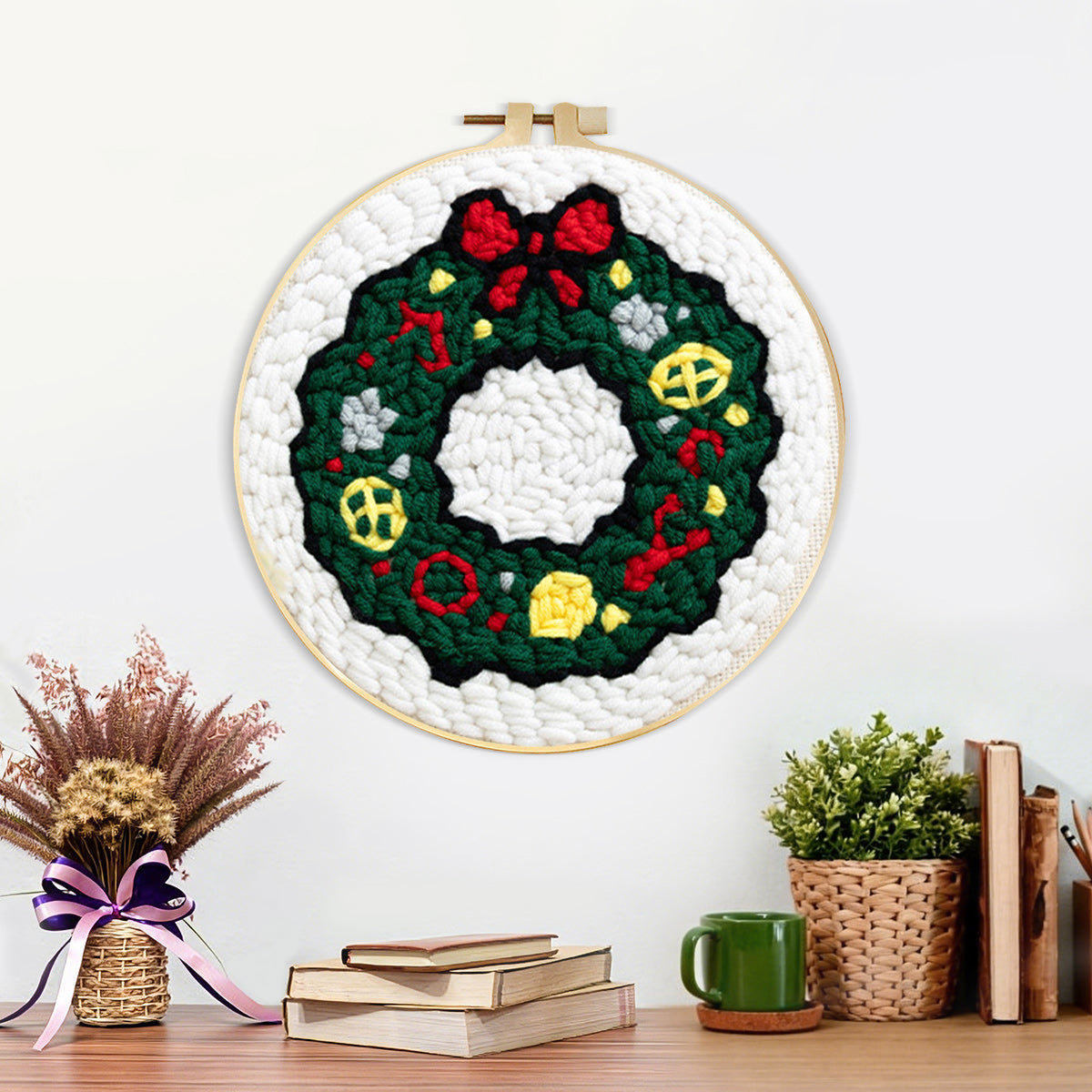 Finished classic green holiday wreath artwork displayed on a wall