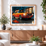 Finished classic orange car cross stitch artwork displayed