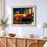 Classic orange car cross stitch artwork displayed on wall as home decor