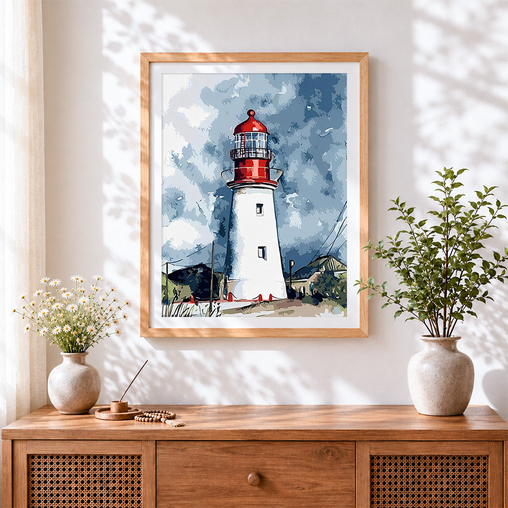 Finished classic red and white lighthouse cross stitch artwork displayed