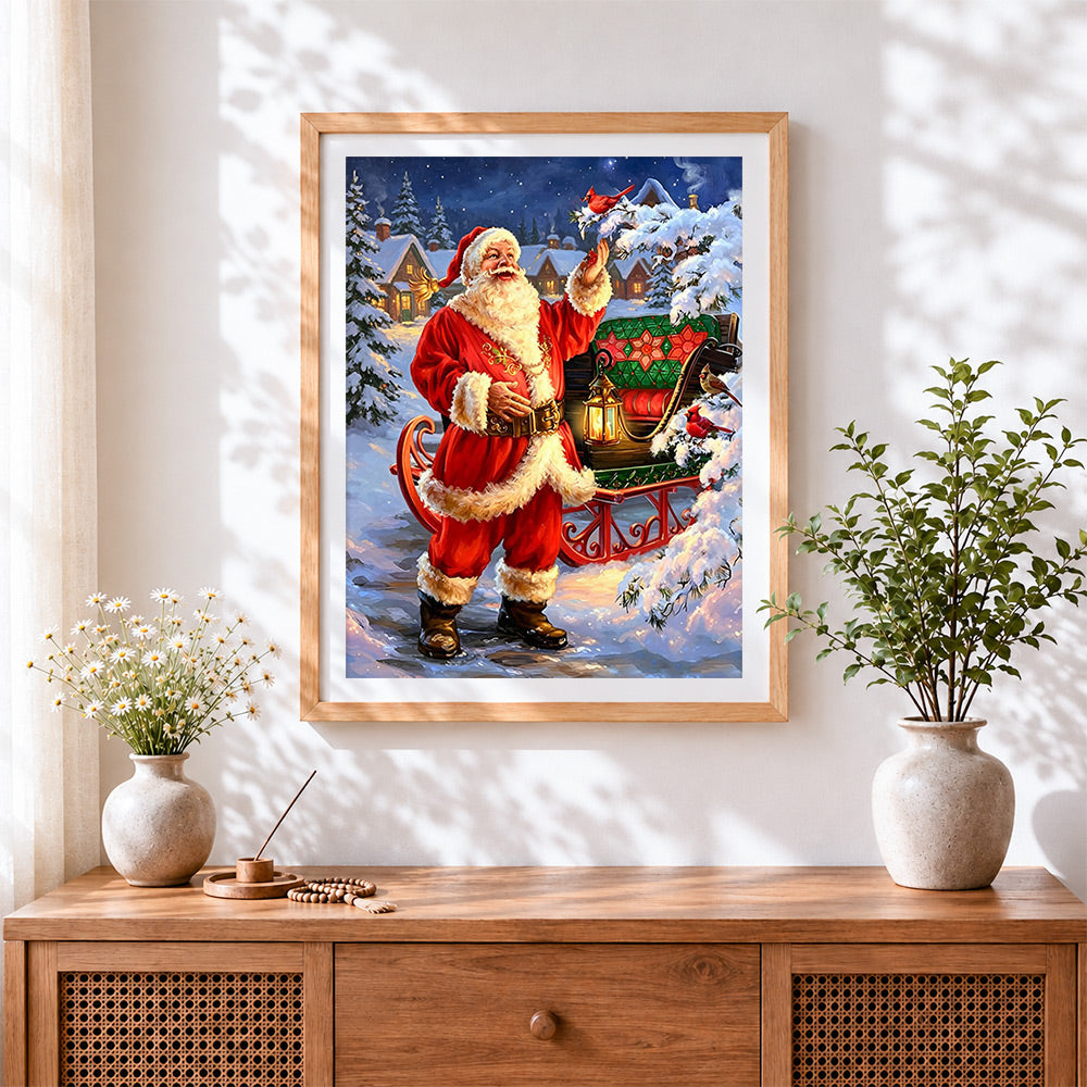 Finished classic santa with sleigh, lantern and red cardinals cross stitch artwork displayed